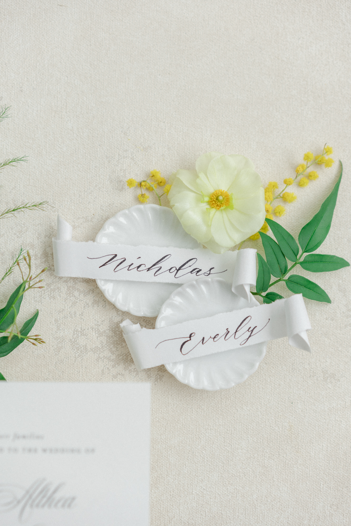 close up shot of custom name scrolls from Colorado wedding calligraphy